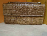 Front view of crocodile leather brown wallet for women