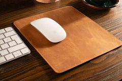 Detailed view of the non-slip rubber base of the genuine leather mouse pad