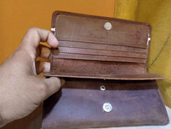 Interior view of women’s brown leather wallet
